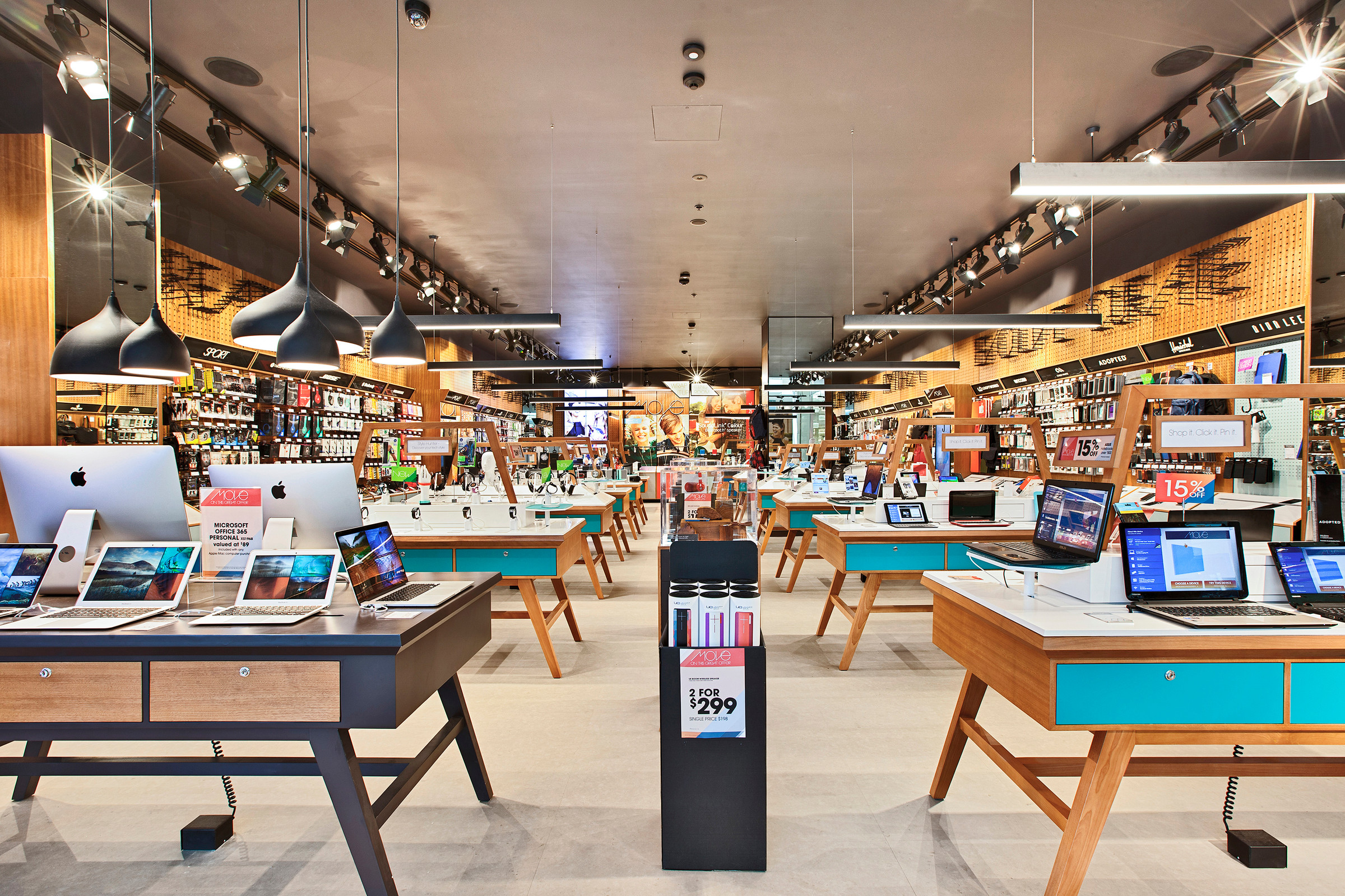 Retail interior lit with SVL track and pendant lighting at the MOVE store.